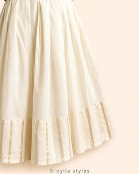 Thennai Onam lehenga skirt detail with golden accents